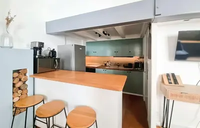 Cuisine ou kitchenette dans l'établissement Fleuriau cozy boheme Proche marché & Vieux Port