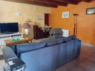 Télévision ou salle de divertissement dans l'établissement Location Thezacaise
