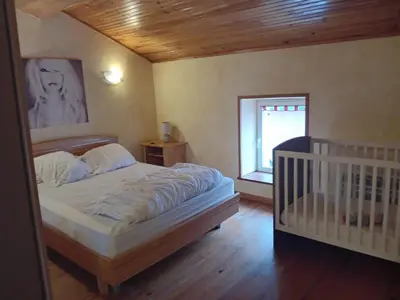 Un ou plusieurs lits dans un hébergement de l'établissement Location Thezacaise