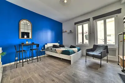 Un ou plusieurs lits dans un hébergement de l'établissement Paradis Bleu - Coeur de ville, Tv 4K, Netflix, Fibre, Confortable, Calme
