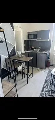 Cuisine ou kitchenette dans l'établissement Appartement cosy proche gare