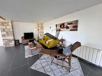 Coin salon dans l'établissement Le Nid Marin - Spacieuse maison avec jardin