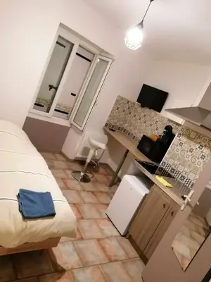Cuisine ou kitchenette dans l'établissement Le Luminaire