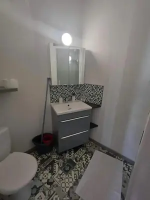 Salle de bains dans l'établissement Le Luminaire