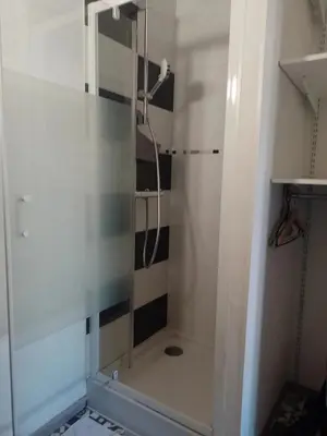 Salle de bains dans l'établissement Le Luminaire