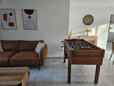 Coin salon dans l'établissement jolie maison centre bourg