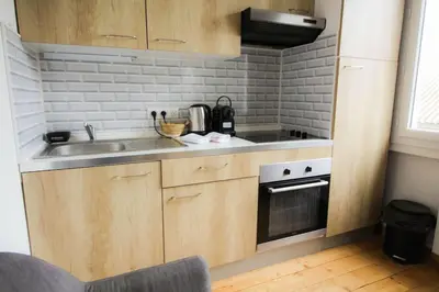 Cuisine ou kitchenette dans l'établissement NEW! Saint Martin 52A- Grand studio lumineux-wifi