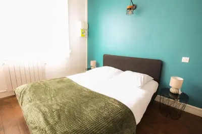 Un ou plusieurs lits dans un hébergement de l'établissement NEW! St Martin 52B -Grand studio lumineux - wifi