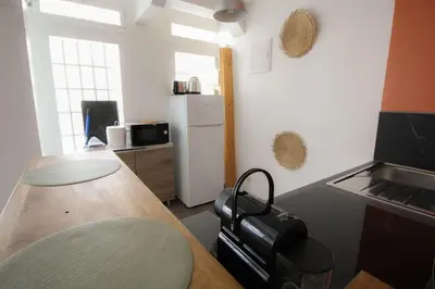 Cuisine ou kitchenette dans l'établissement NEW! St Martin 52C- Grand studio