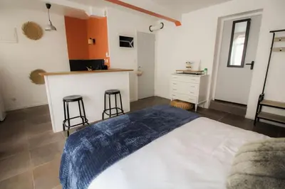 Un ou plusieurs lits dans un hébergement de l'établissement NEW! St Martin 52C- Grand studio
