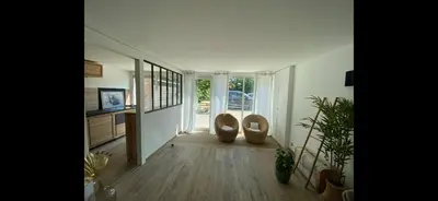 Télévision ou salle de divertissement dans l'établissement Villa La Rochelle