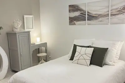 Un ou plusieurs lits dans un hébergement de l'établissement Gîte aux portes d'Angoulême