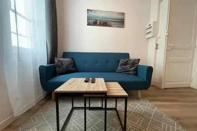 Coin salon dans l'établissement Le Saintonge avec climatisation