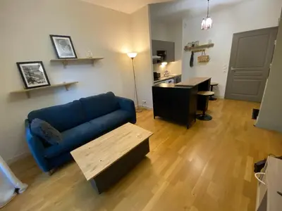 Coin salon dans l'établissement T2 cosy et calme, parking privé et fibre inclus