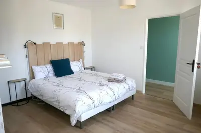 Un ou plusieurs lits dans un hébergement de l'établissement Chambre dhôtes familiale à Saint Pierre du Chemin