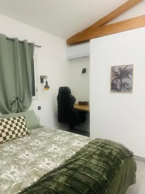 Un ou plusieurs lits dans un hébergement de l'établissement Chambre confort