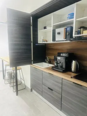 Cuisine ou kitchenette dans l'établissement Chambre confort