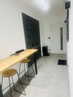 Télévision ou salle de divertissement dans l'établissement Chambre confort