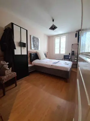 Un ou plusieurs lits dans un hébergement de l'établissement Maison le trèfle