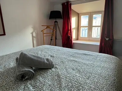 Un ou plusieurs lits dans un hébergement de l'établissement ღ Pertuis - Au cœur de Saintes, Spacieux & Cosy