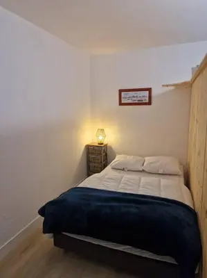 Un ou plusieurs lits dans un hébergement de l'établissement Appartement studio Pompon, Wifi, 2 couchages, charme, centre historique