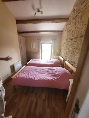 Un ou plusieurs lits dans un hébergement de l'établissement Gites at Le Tilleul - Le Cerisier