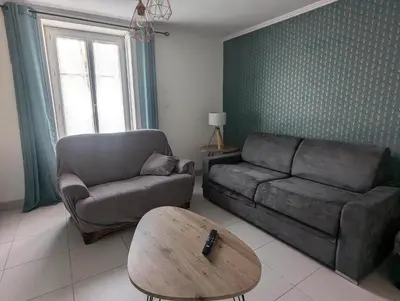 Coin salon dans l'établissement Maison de bourg avec jardin