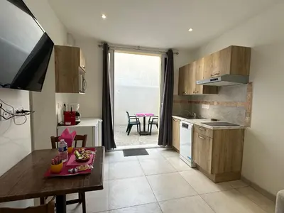 Cuisine ou kitchenette dans l'établissement Chez Camille & Emma - Climatisé
