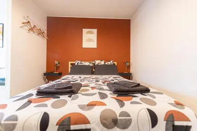 Un ou plusieurs lits dans un hébergement de l'établissement S1 SWEET HOMES Angoulême I Secteur Champs de Mars I Studio 2 couchages - Animaux acceptés