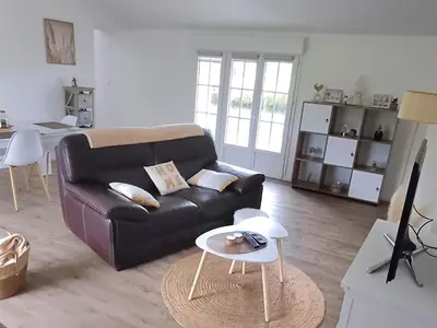 Coin salon dans l'établissement Maison calme au bord de l'eau