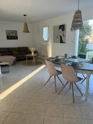 Coin salon dans l'établissement Maison BELMIRA