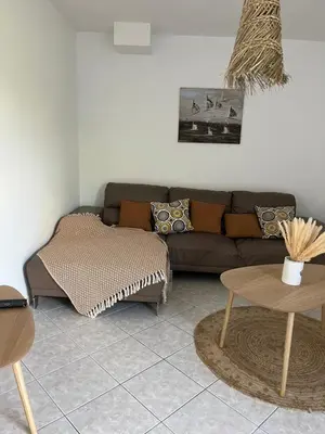 Coin salon dans l'établissement Maison BELMIRA