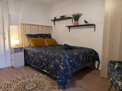 Un ou plusieurs lits dans un hébergement de l'établissement L'Exotic - Studio Centre-Ville