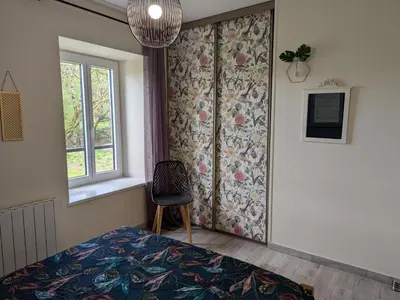 Un ou plusieurs lits dans un hébergement de l'établissement Gîte au Bord de la Rivière avec Terrasse, Internet et Jardin - FR-1-653-271