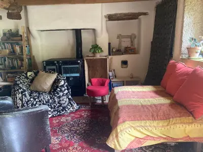 Coin salon dans l'établissement Longère en bordure de bois