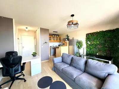 Coin salon dans l'établissement Le Corsaire - Appartement spacieux avec terrasse