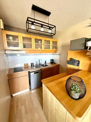 Cuisine ou kitchenette dans l'établissement Le Corsaire - Appartement spacieux avec terrasse