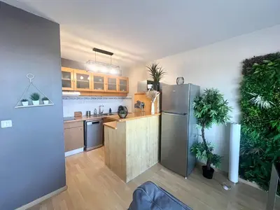 Cuisine ou kitchenette dans l'établissement Le Corsaire - Appartement spacieux avec terrasse