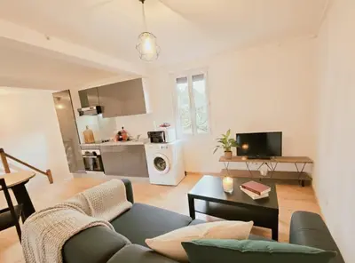 Cuisine ou kitchenette dans l'établissement Appartement paisible proche centre