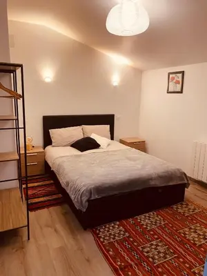 Un ou plusieurs lits dans un hébergement de l'établissement Appartement 4 personnes