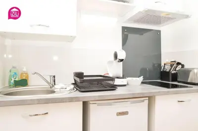 Cuisine ou kitchenette dans l'établissement Huka Studio - Centre Ville Poitiers