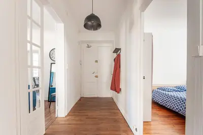 Un ou plusieurs lits dans un hébergement de l'établissement Appartement Ancien - 4 chambres - Centre ville Poitiers