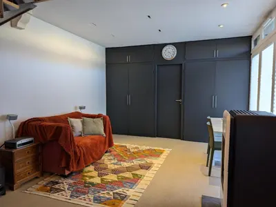 Coin salon dans l'établissement Gîte charmant avec terrasse privative, animaux admis - FR-1-653-275