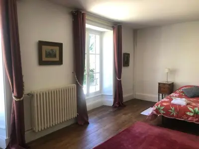 Un ou plusieurs lits dans un hébergement de l'établissement Château de La Grange