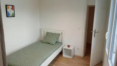 Un ou plusieurs lits dans un hébergement de l'établissement Home in Niort