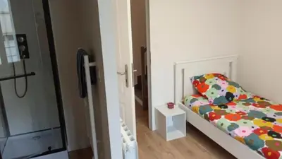 Un ou plusieurs lits dans un hébergement de l'établissement Home in Niort