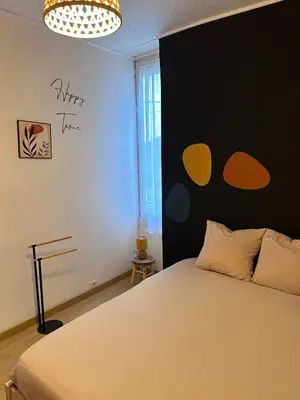 Un ou plusieurs lits dans un hébergement de l'établissement La pause Biardaise -Appartement 2 chambres à Biard