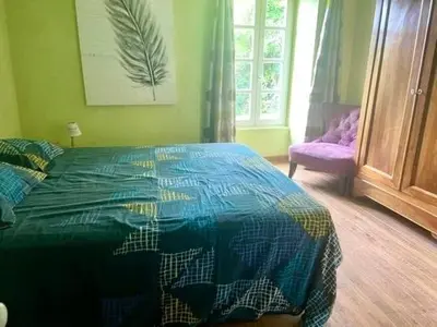 Un ou plusieurs lits dans un hébergement de l'établissement Glycine, 6 person cottage