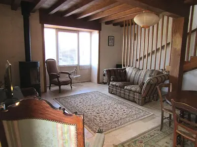 Coin salon dans l'établissement Hermitage, Gites Villeblanche