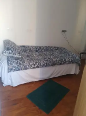 Un ou plusieurs lits dans un hébergement de l'établissement Au Coin Maison